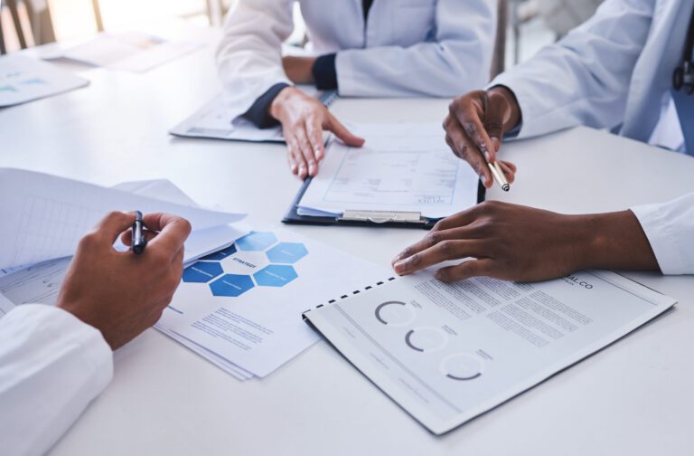 Professionals discussing documents together