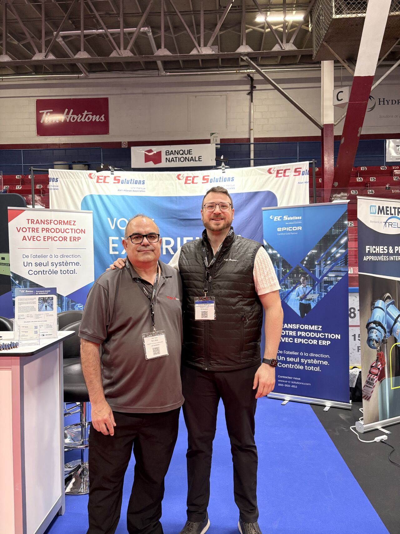 The ECSolution team standing in front of their booth at the SIAT 2026 exhibition.